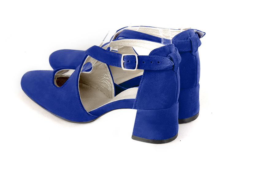Women's electric blue elegant closed-back heels, with crossed straps. .  - Rear view